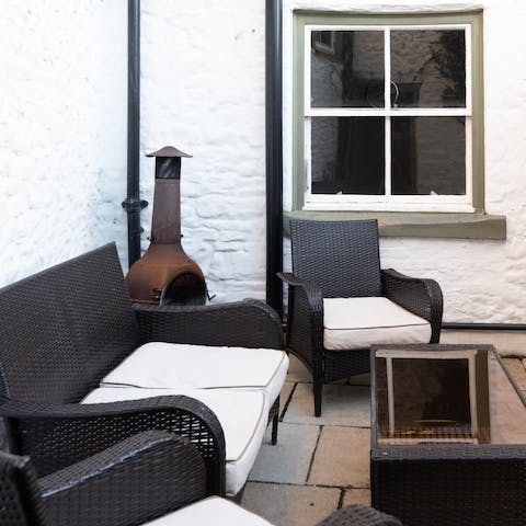 Pop out to the secluded courtyard and light the chiminea on chilly evenings