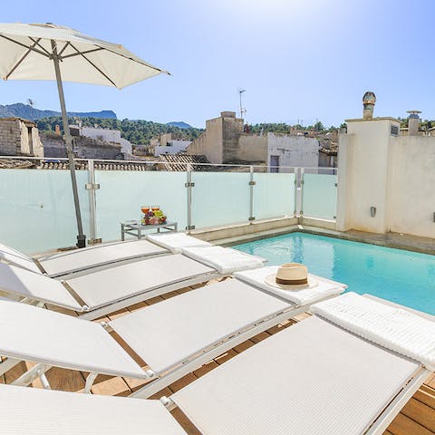 Relax on the sun beds on the rooftop terrace or go for a dip in the private pool