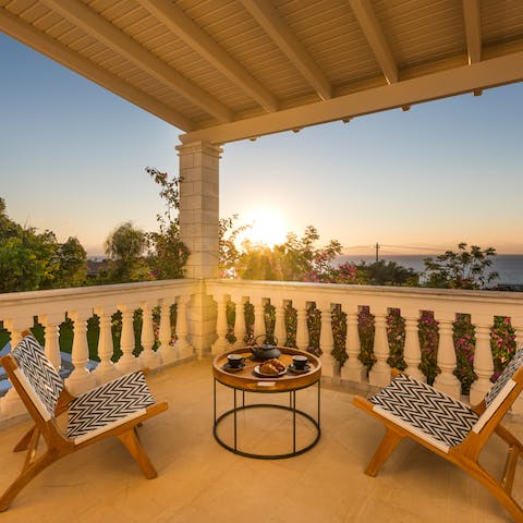 Drink in the sunrise over a morning coffee on the private veranda