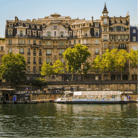Stroll along the banks of the Seine River, just two blocks from the apartment