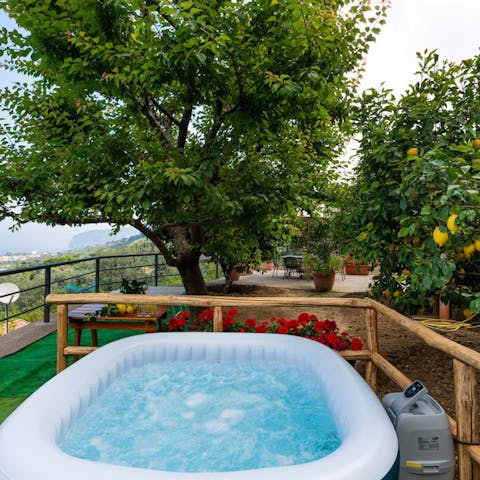 Unwind in the Jacuzzi beside the lemon grove