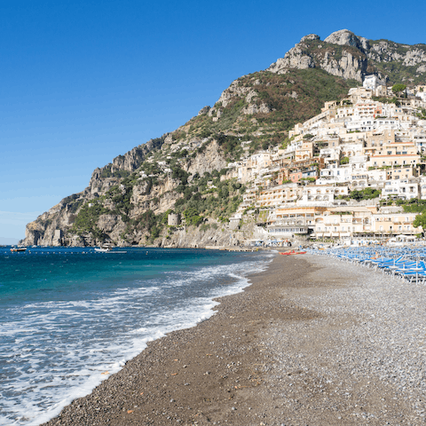 Visit the beautiful Positano Beach and swim in its refreshing turquoise waters