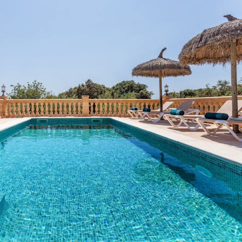 Spend sun-kissed summer days relaxing by the pool