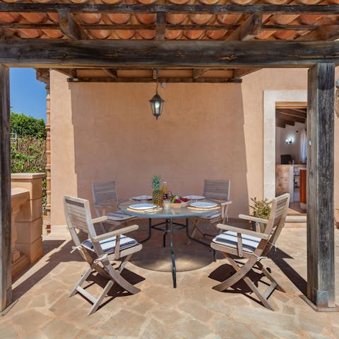 Serve up light lunches in the shade of the terracotta-tiled pergola