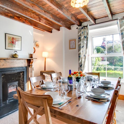 Gather around the table and raise a glass to the magic of coastal living