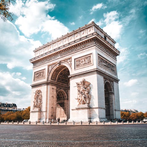Visit the historic Arc de Triomphe, a twenty-minute walk away