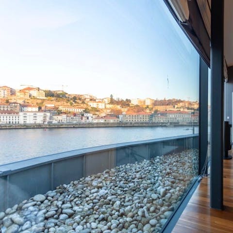 Take in uninterrupted views of the Ribera district from across the river