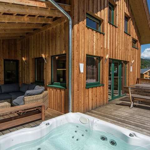 Unwind in the hot tub with a bottle of red