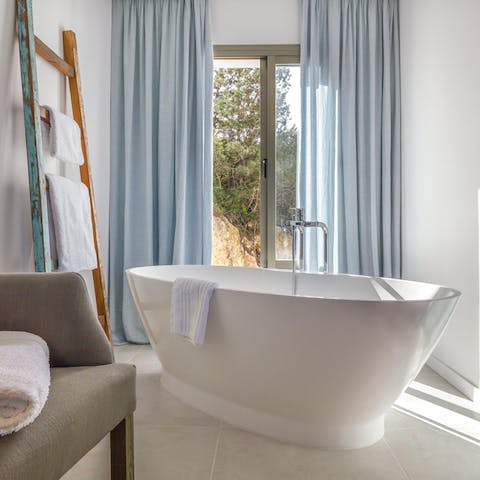 Wash off the sun cream before hopping in the gorgeous roll-top bath