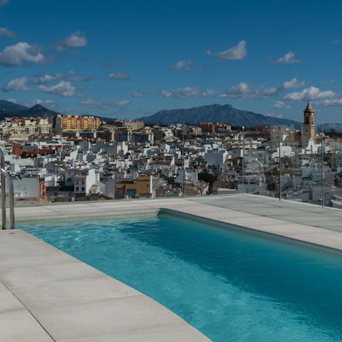 Take a dip in the communal pool, with the stunning views all around you 