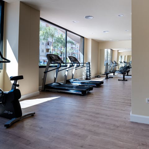 Stay on top of your fitness goals in the communal gym 