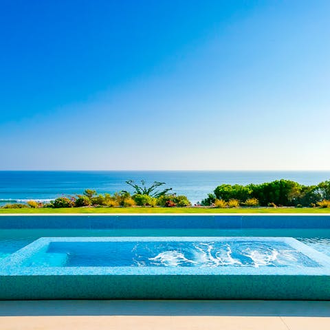 Take in the sublime Pacific Ocean vistas from the pool and jacuzzi