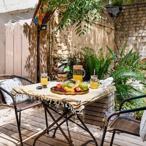 Enjoy breakfast in the sun on the private terrace outside