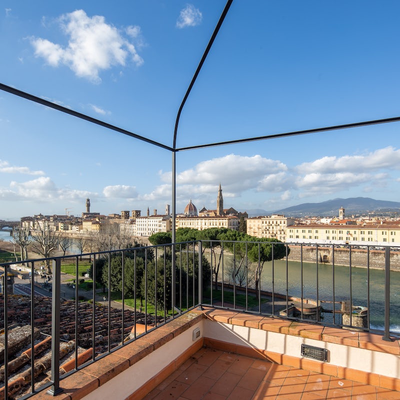 Grab your morning coffee and wake up to the centuries' old skyline underlined by ripples of the Arno River