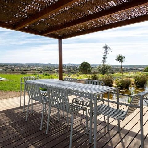 Gather out on the covered patio for alfresco feasts 