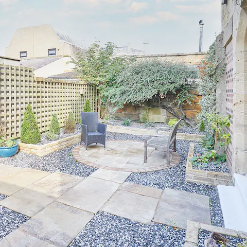 Pop into the attractively landscaped back garden with a cup of coffee