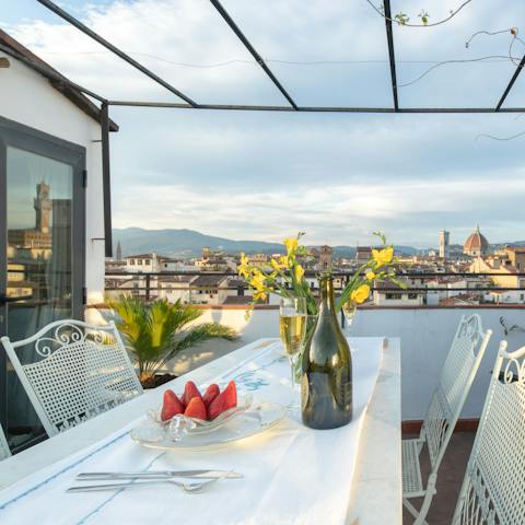 Enjoy meals alfresco with panoramic views across the city rooftops