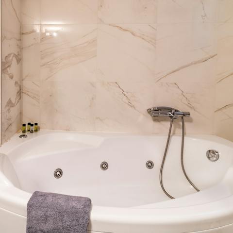 Treat yourself to a long soak in the Jacuzzi bath after a busy day of exploring