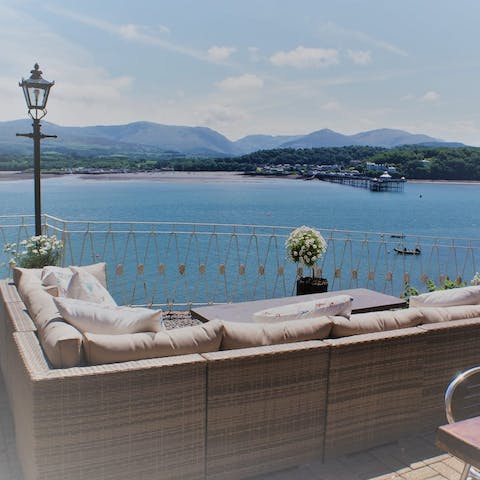 Sit out on the terrace and enjoy the glorious view of Bangor Pier and the Snowdonia mountain range in the background