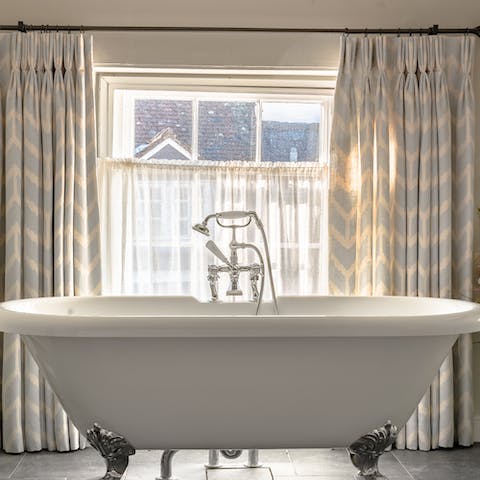 Enjoy a relaxing soak in the swanky freestanding bathtub