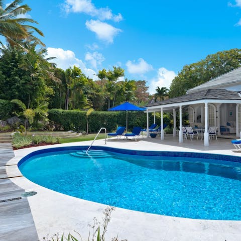 Wake up to beautiful garden views and spend the morning by the pool