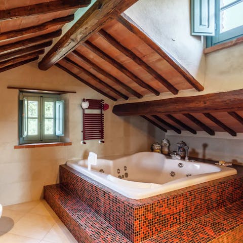 Enjoy this unique bathroom by taking a long soak in the jacuzzi tub