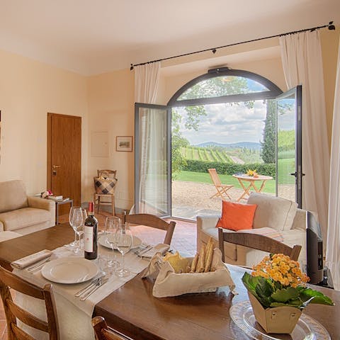 Indulge in local delicacies whilst taking in the views of the vineyards