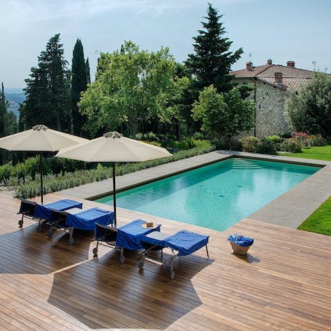 Soak up the Tuscan sun in the communal pool