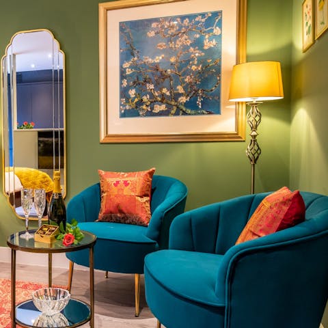 Recline with a glass of your favourite tipple in the plush armchair