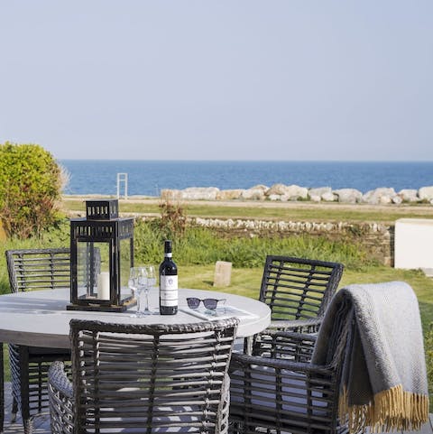 Take in the view of the sea as you enjoy an al fresco meal in your private garden
