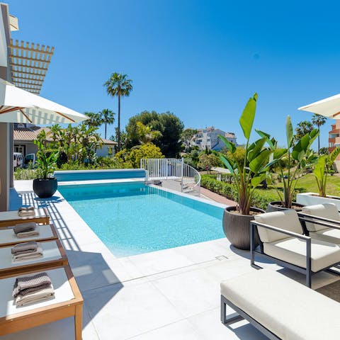 Spend relaxing days by the pool or head to the nearby beach