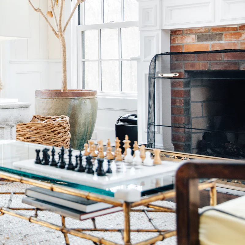 Take a seat and tackle a game of chess in the stylish living room