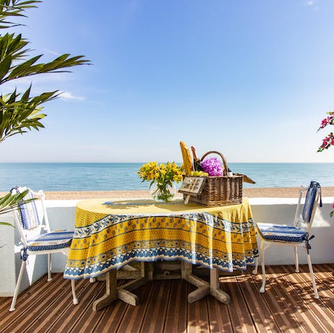 Sit out under the sun and dine alfresco by the sea