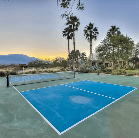 Play a game of tennis on your own court