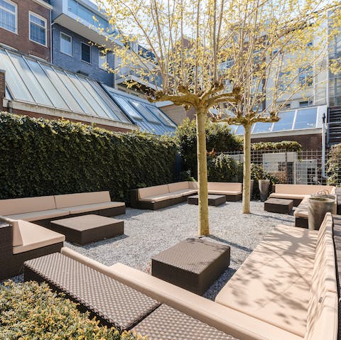 Relax with a beer in the tranquil terrace garden
