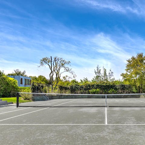 Play a game of tennis on the private courts
