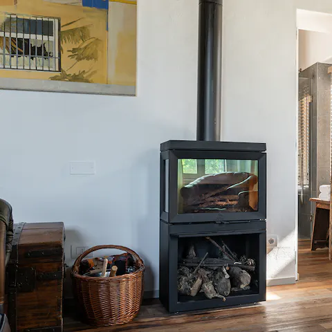 Spend evenings curled up by the warm glow of the fireplace