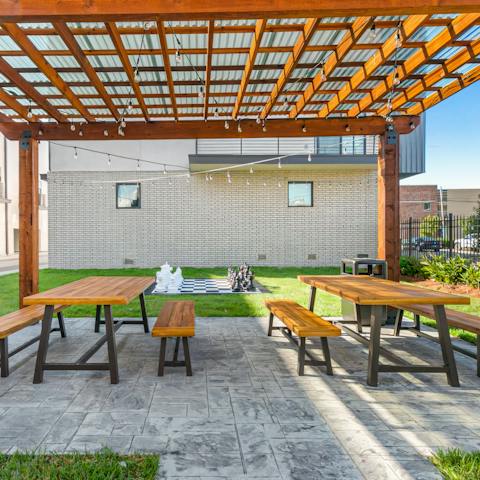 Enjoy a spot of lunch in the sunshine at the communal picnic benches