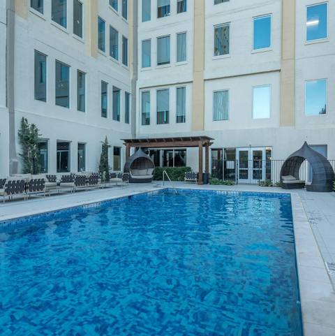 Swim laps in the communal pool