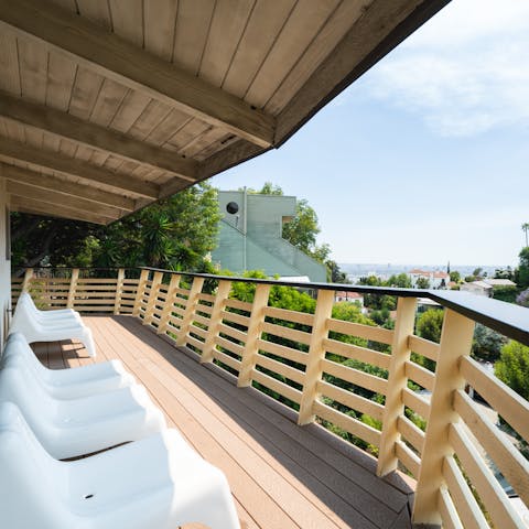 Take in the stunning panoramic views from the wrap-around balcony