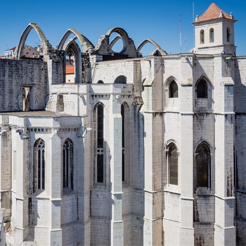 Stroll ten minutes to visit the striking gothic building of Covento do Carmo