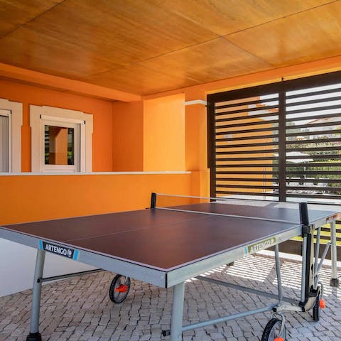 Challenge each other to a table tennis tournament