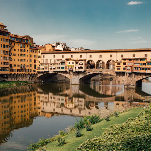Stroll across scenic Ponte Vecchio, four minutes away on foot