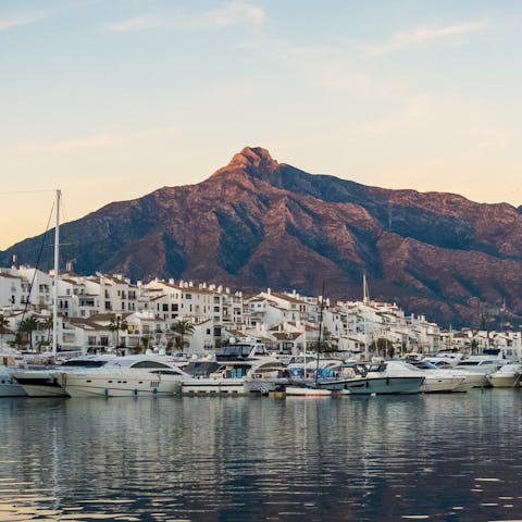 Enjoy refreshing seafront strolls in Marbella – a short drive away