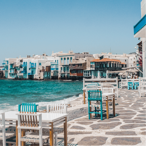 Explore the pretty streets of Mykonos town – a short drive away