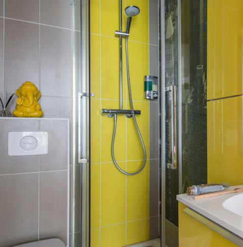 A bold yellow bathroom