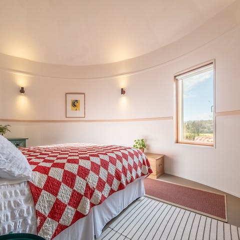 Feel a wonderful sense of warmth and comfort in the cosy bedroom