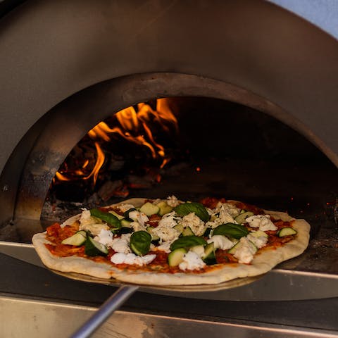 Cook your own creations in the pizza oven