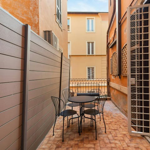Enjoy a glass of Italian wine on the small terrace