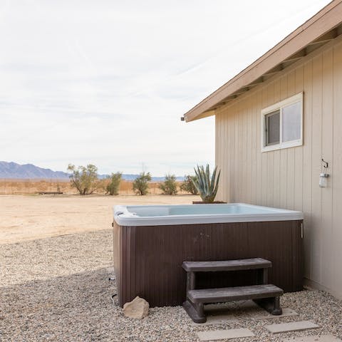 Admire the mountain views whilst soaking in the hot tub